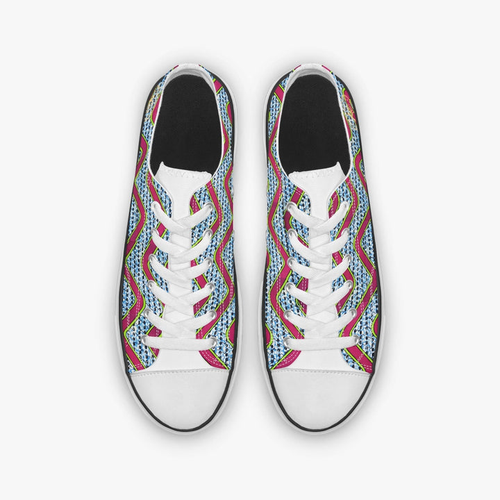 Baskets KAKIPS Évasion Zebra Blanc en toile avec motif wax zébré bleu et rose et semelle blanche